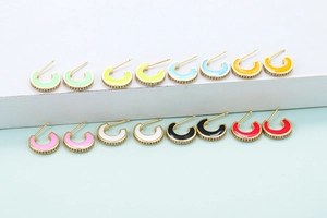 Detailed grid of colorful enamel C-shaped stud earrings in various vibrant candy colors