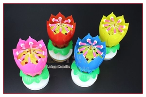 Rotating musical lotus birthday candles in pink, red, blue, and yellow colors
