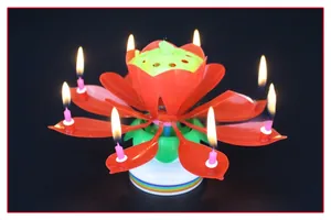 Blooming lotus flower music candle with double-layer rotating petals and small burning flames
