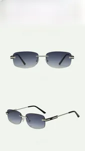 Detailed views of rectangle rimless sunglasses with gradient grey lenses and silver temples