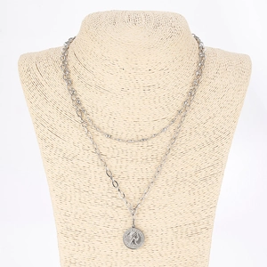 Dual-layer silver coin pendant necklace with bead and link chains on mannequin
