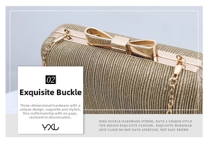 Close-up of golden bow metal clasp and shiny textured fabric on elegant evening bag
