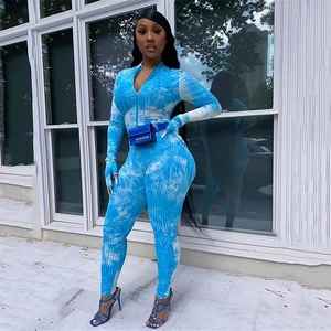 Combinaison moulante bleue tie-dye pour femme avec manches longues et fermeture éclair avant