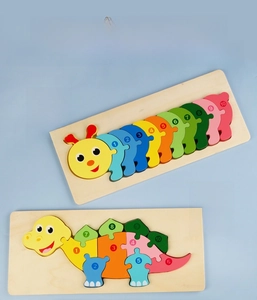 Close-up of wooden caterpillar and dinosaur puzzles with 1-10 numbering for early learning