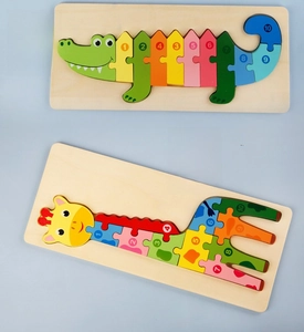 Detail of wooden animal puzzles featuring a crocodile and giraffe with numbers 1-10
