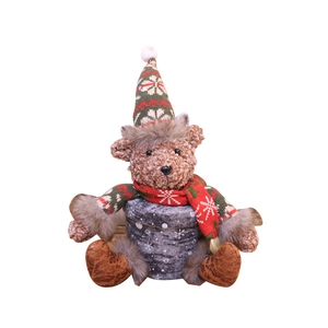 Christmas plush teddy bear decoration with red hat and snowflake gift box on white background