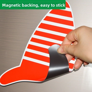 Detail of red and white striped magnetic fridge sticker with flexible soft rubber back