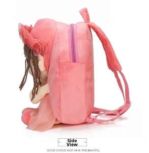 Side view of pink plush cartoon backpack for kids featuring soft doll design detail