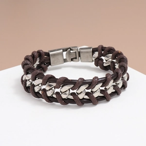 Detailed view of dark brown braided leather woven with silver metallic chain and clasp