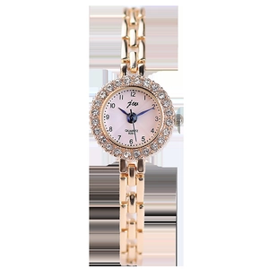 Elegant gold quartz watch for women with rhinestone bezel and round pink dial