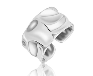 Detailed view of silver wide open ring featuring irregular hammered metal textures