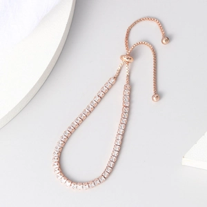 Elegant rose gold tennis bracelet with square-cut zircons and adjustable slider chain