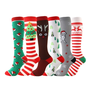 Detailed knit patterns on six pairs of festive Christmas theme compression socks