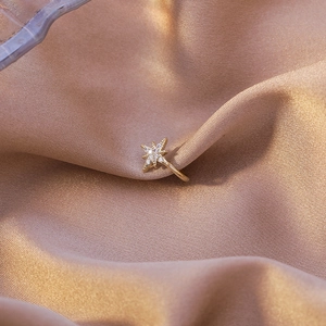 Sparkling zircon star ear cuff clip on gold silk fabric for elegant non-pierced jewelry