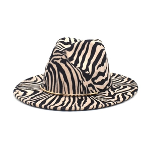 Detailed view of the zebra print fedora hat with a delicate gold metal band decoration