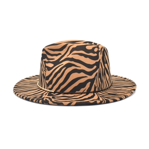 Classic zebra print wool fedora hat with black decorative band and gold buckle detail