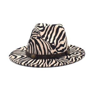 Detailed view of the zebra pattern wool fedora with a studded leather band and stitching