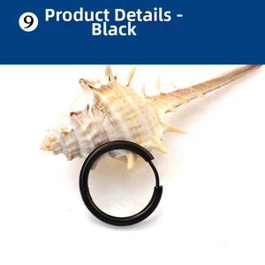 Detailed view of black matte stainless steel hoop earring with a smooth circular design