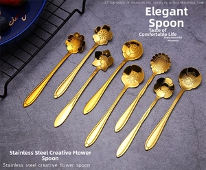 Detailed overhead view of 8-piece gold plated flower shaped stainless steel spoons