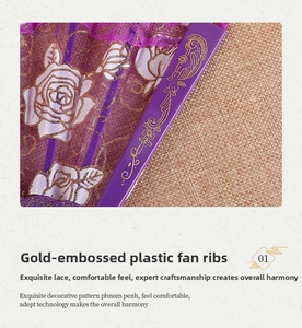 Close-up of purple lace folding fan with gold foil rose pattern and ornate plastic ribs