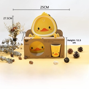 Detail of yellow duck bamboo fiber dinnerware set for kids in an eco-friendly gift box