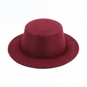 Detailed view of the burgundy wool felt flat-top hat with a classic wide brim and retro style
