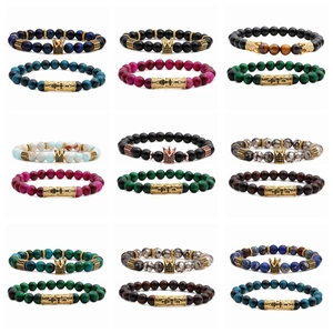 Detailed grid showing stone bead bracelets with metal crown and hollow tube charms