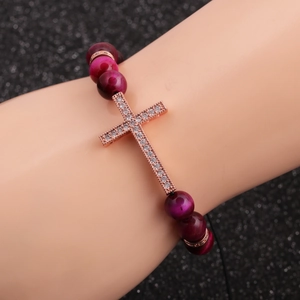 Men's 8mm purple tiger eye bead bracelet with rose gold zircon cross on model's wrist
