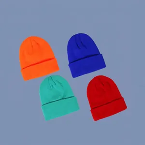 Casual knitted beanies in orange, blue, green, and red for kids with rolled edge detail