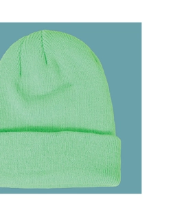 Detail shot of mint green ribbed knit beanie showing high-quality vertical texture and folded cuff