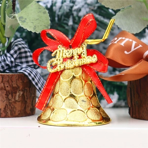 Golden Christmas bells with red bows and Merry Christmas engraving for tree decor