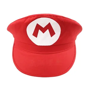 Detail of red Super Mario M logo hat showing cotton twill fabric and white embroidery
