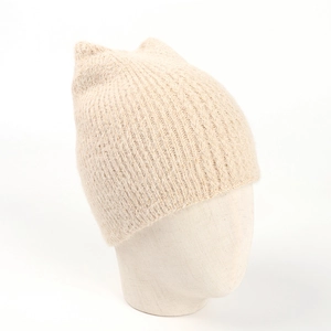 Detail shot of the fuzzy beige knit beanie with cute fox ears and soft plush texture