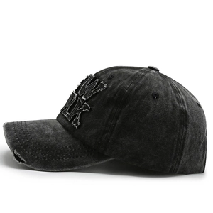 Distressed wash cotton baseball cap with New York embroidery and retro ripped details