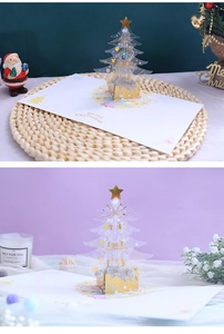 Detail of 3D Christmas card showing a crystal tree with gold foil Merry Christmas text