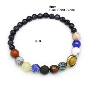 Detailed view of the Solar System bracelet showing 6mm Blue Sand Stone and planet beads