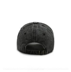 Back view of washed black denim baseball cap with adjustable vintage copper metal buckle