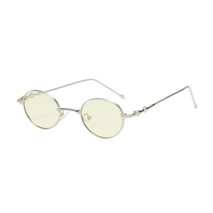 Vintage oval metal sunglasses with silver frame and amber lenses for a trendy street look