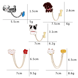 Cartoon dog and cat enamel pins with chains, including Corgi and Bulldog designs