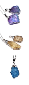 Detail showing irregular natural crystal pendants with silver-plated edges on chains