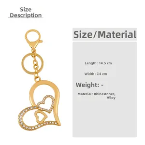 Detail view of rhinestone heart keychain with dimensions 14.5cm length and 7.4cm width
