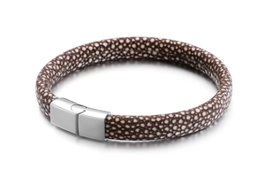 Detail of dark brown stingray leather bracelet with silver magnetic stainless steel clasp