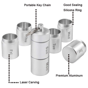 Waterproof aluminum alloy pill organizer with seven compartments and a portable keychain