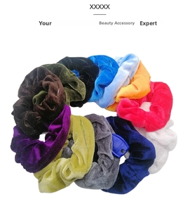 Set of 10 colorful velvet scrunchies with soft texture and glossy finish in a circular layout