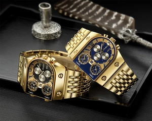 Detail of Oulm multi-timezone quartz watches in gold with blue and black dials