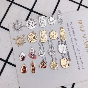 DIY jewelry making charms set featuring gold and silver stars moon and sun with zircon