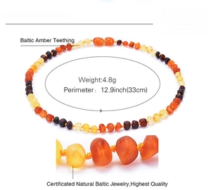 Detailed view of 33cm Baltic amber baby necklace with size and 4.8g weight specs