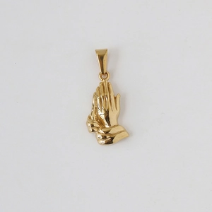 Detailed close-up of 18k gold plated praying hands pendant showing metallic texture
