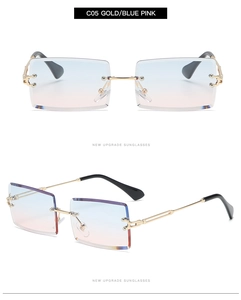 Detail of rimless square sunglasses with gold metal temples and blue-pink gradient lenses