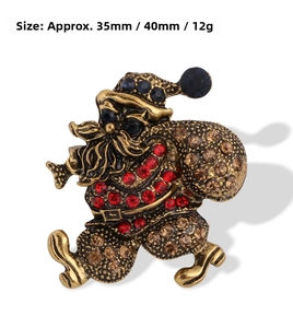 Detail view of Santa Claus brooch with red rhinestones and 35mm x 40mm measurements